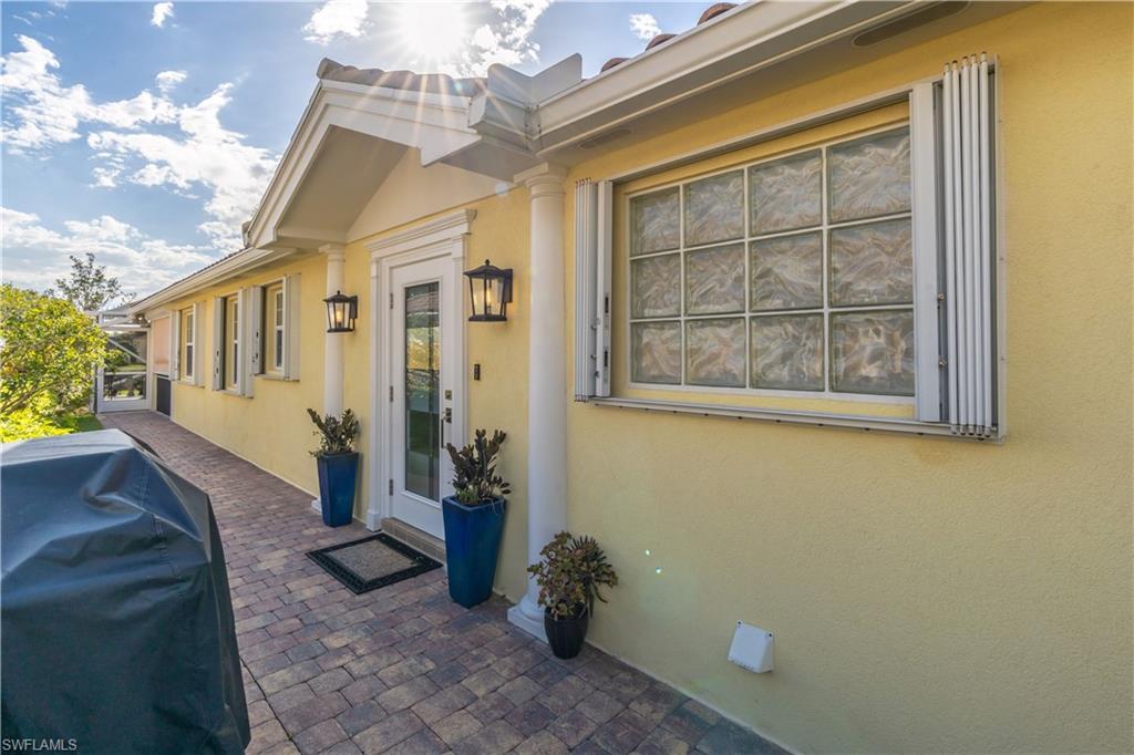 7568 Novara Court Naples, FL 34114 - Photo 5 of 34 a view of a house with a large window