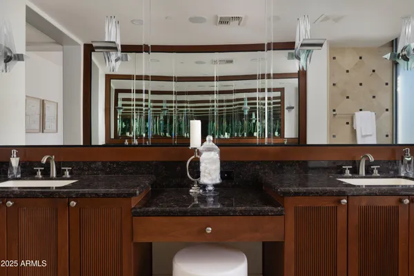 a kitchen with a refrigerator and a sink