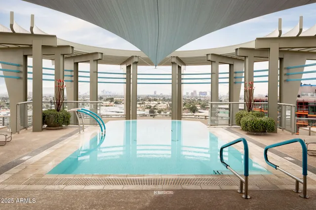 a view of a living room and dining room