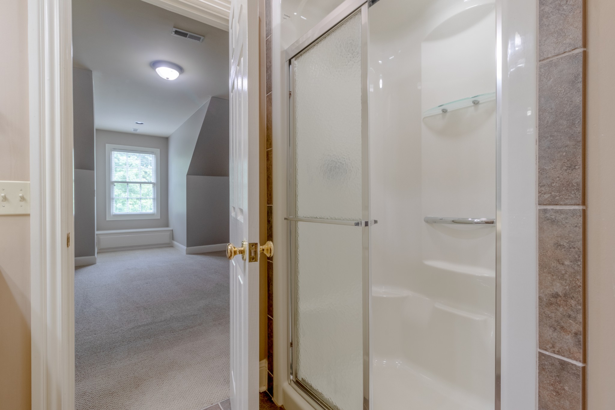 500 Georgetown Road Clarksville, TN 37043 - Photo 54 of 67 a view of a bathroom with a glass shower door