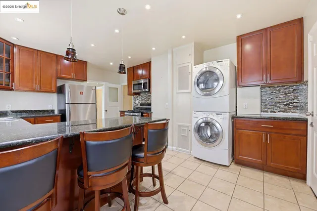 a view of kitchen with washer and dryer