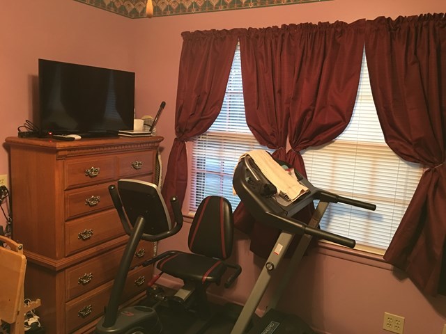 3512 Warpath Road Macon, GA 31217 - Photo 2 of 21 a room with furniture and flat screen tv