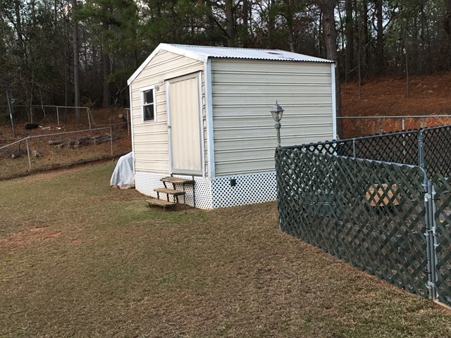 3512 Warpath Road Macon, GA 31217 - Photo 11 of 21 a view of a small house with backyard
