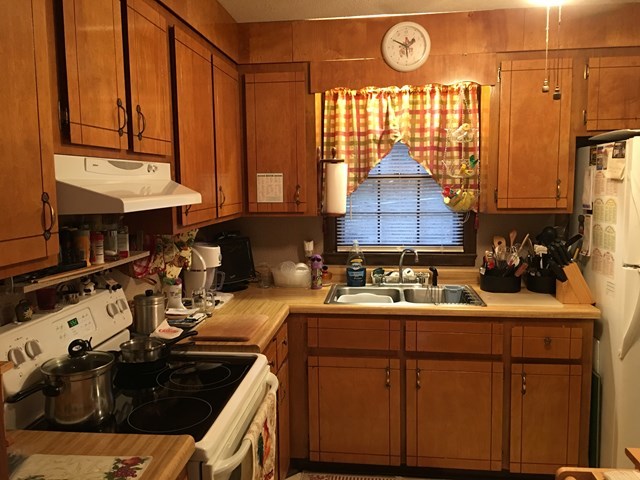 3512 Warpath Road Macon, GA 31217 - Photo 16 of 21 a kitchen with a sink and a stove top oven