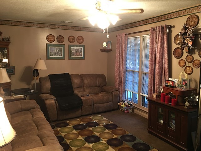 3512 Warpath Road Macon, GA 31217 - Photo 17 of 21 a living room with furniture and a window