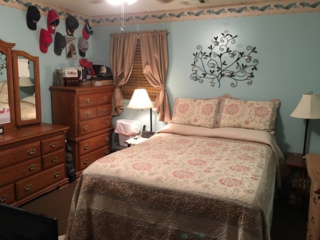 3512 Warpath Road Macon, GA 31217 - Photo 3 of 21 a bedroom with a bed and a dresser
