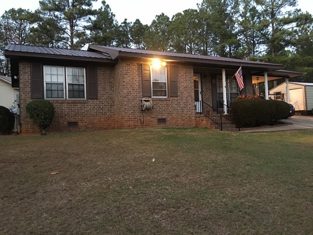 3512 Warpath Road Macon, GA 31217 - Photo 7 of 21 a backyard of a house with table and chairs