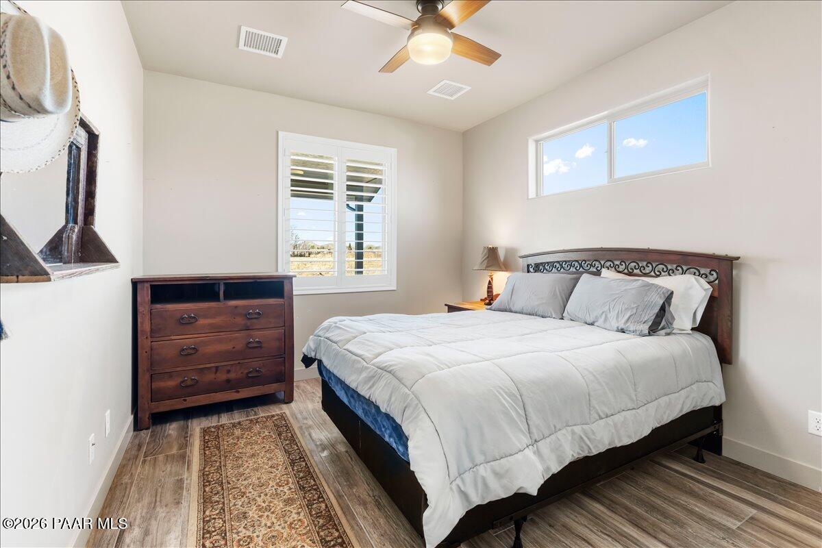 22367 North Malapai Ridge Road Paulden, AZ 86334 - Photo 13 of 23 a bedroom with a bed and a dresser