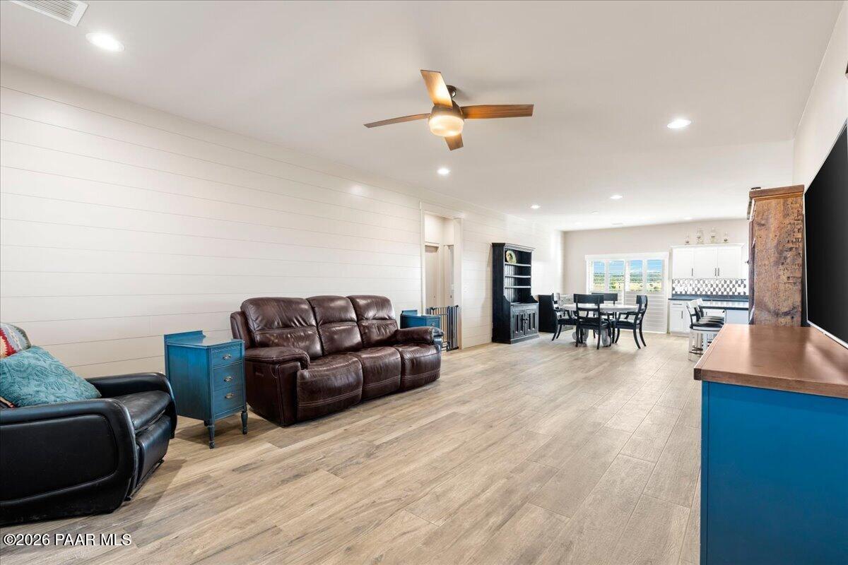 22367 North Malapai Ridge Road Paulden, AZ 86334 - Photo 4 of 23 a living room with furniture and a flat screen tv
