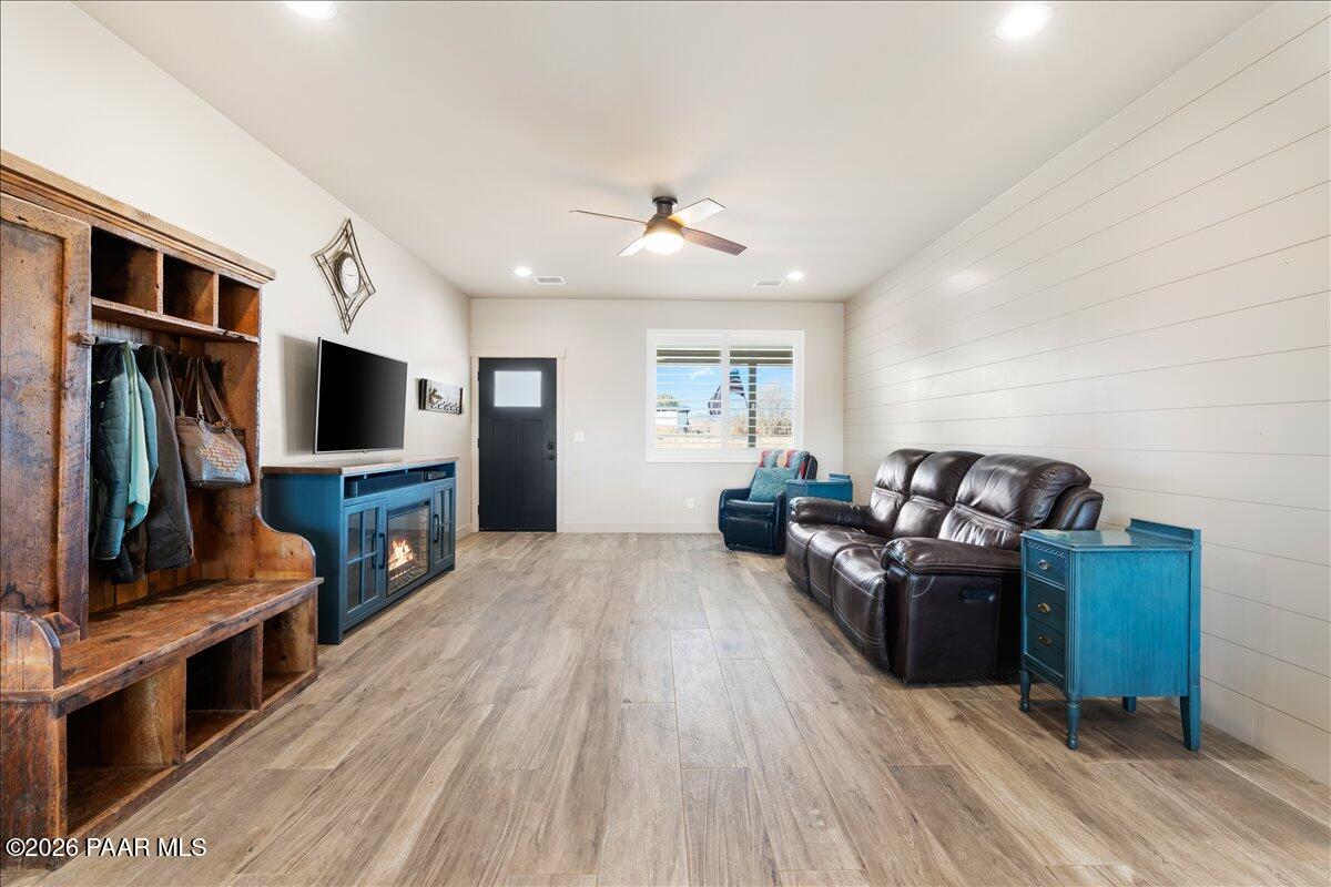 22367 North Malapai Ridge Road Paulden, AZ 86334 - Photo 5 of 23 a living room with furniture and a flat screen tv