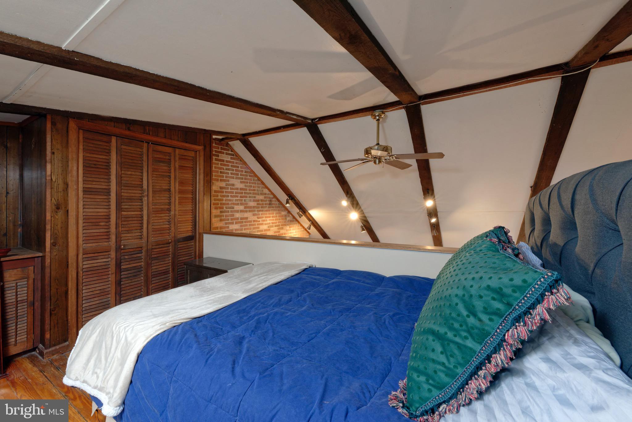 1608 Zulla Road Middleburg, VA 20117 - Photo 13 of 52 a bedroom with a bed and a window