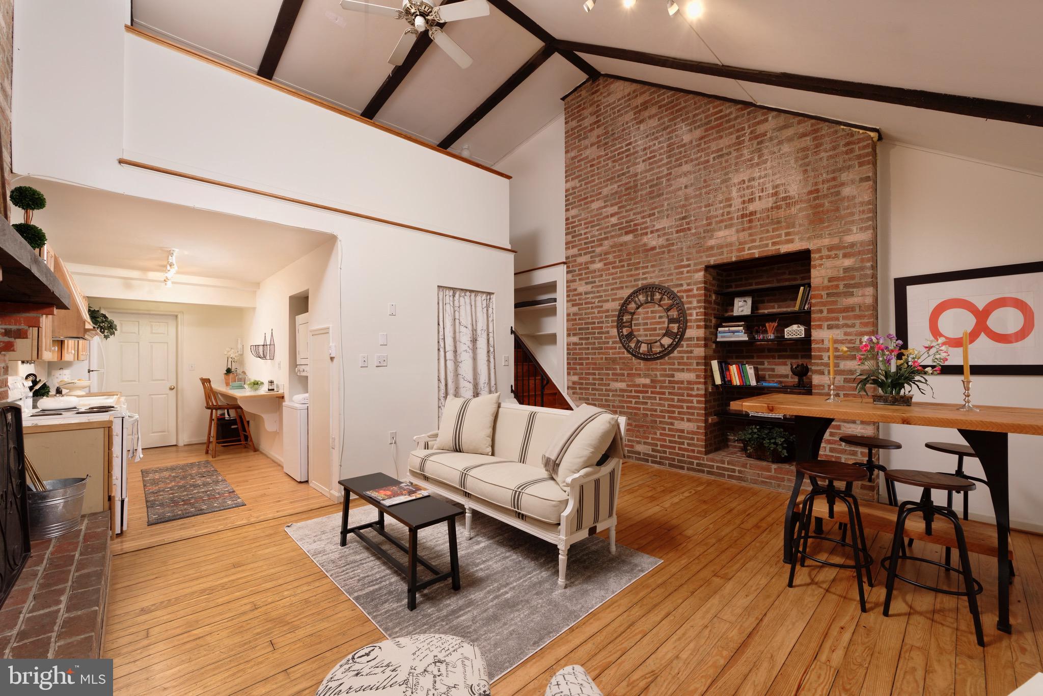 1608 Zulla Road Middleburg, VA 20117 - Photo 14 of 52 a living room with furniture and wooden floor