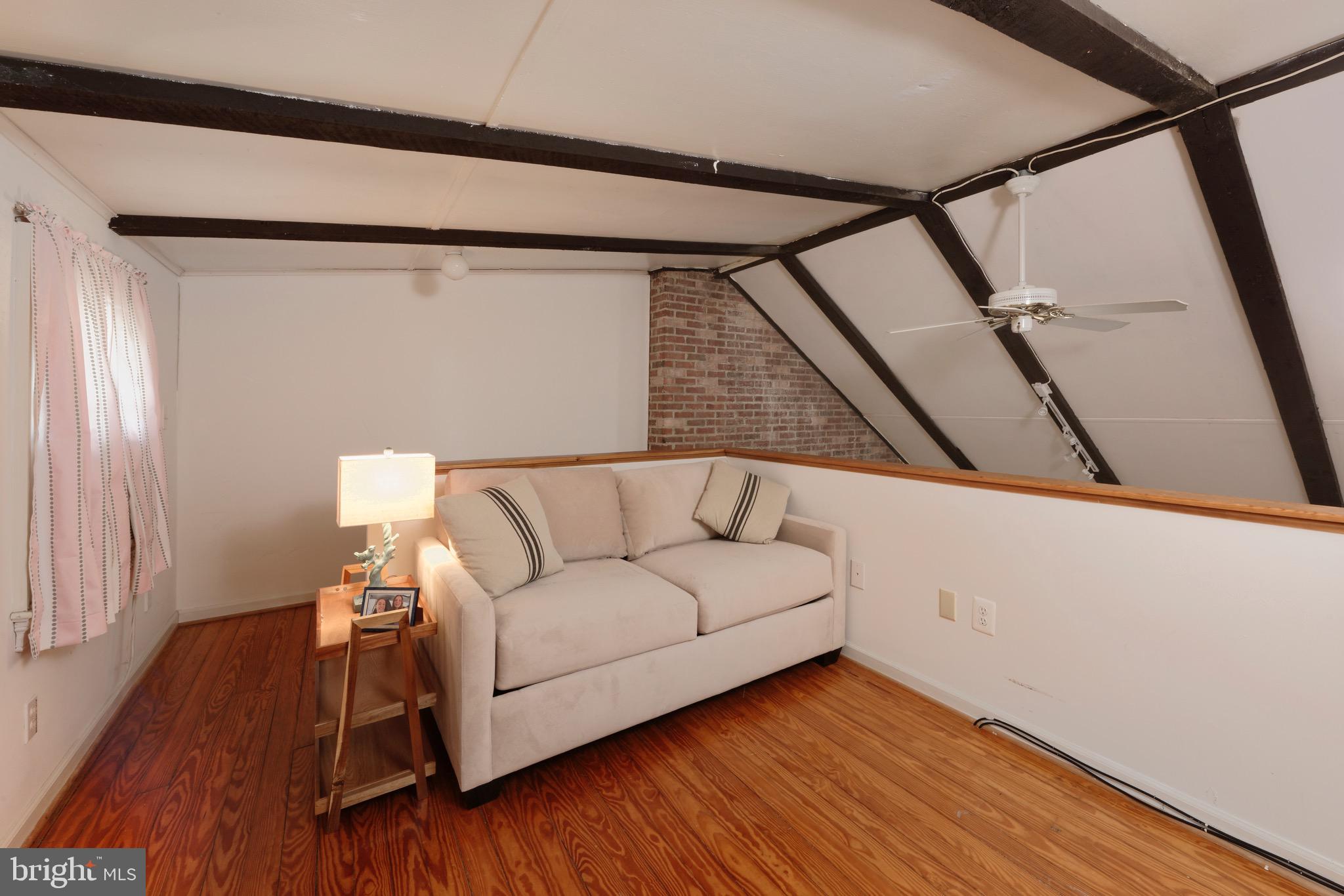 1608 Zulla Road Middleburg, VA 20117 - Photo 22 of 52 a living room with a couch