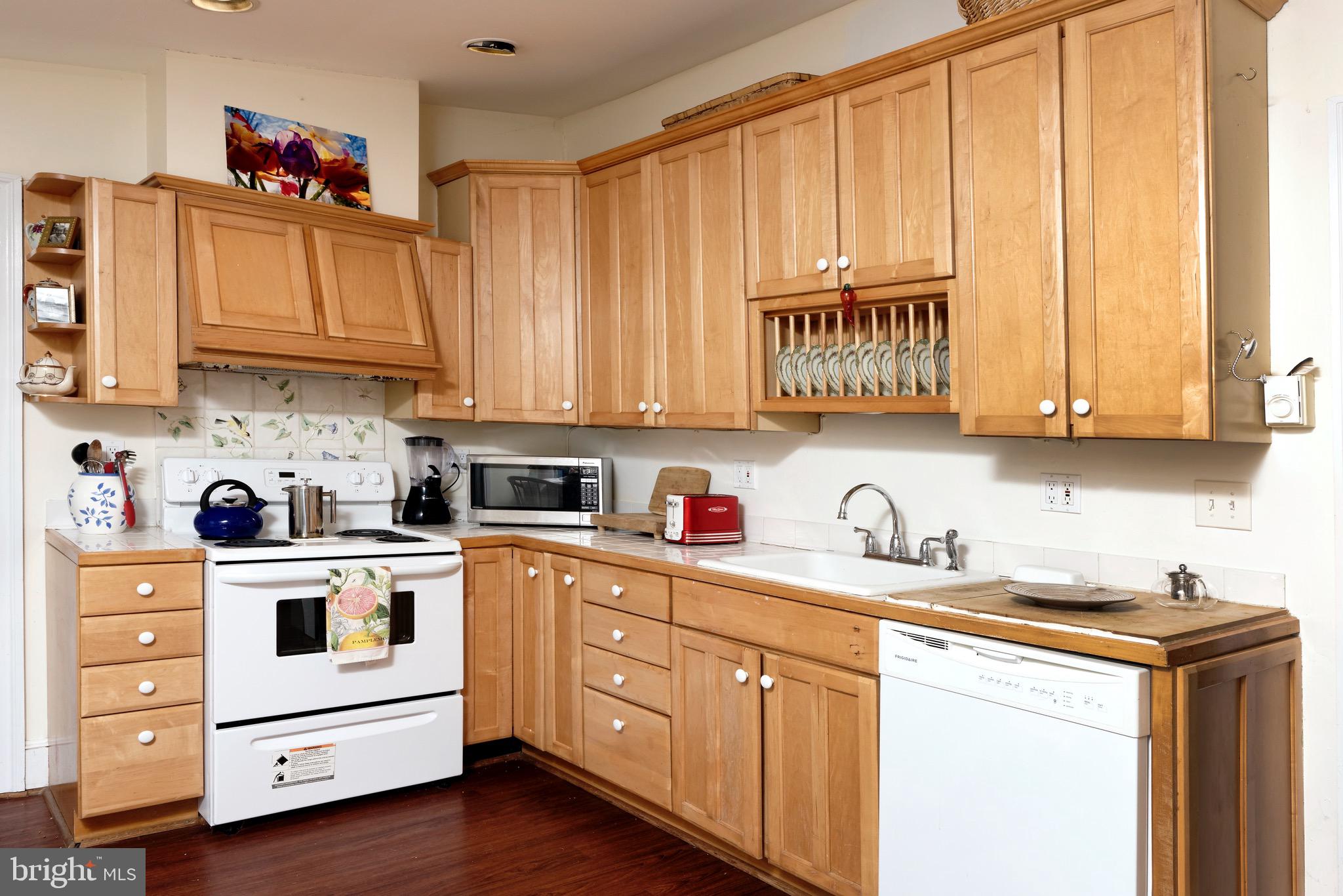 1608 Zulla Road Middleburg, VA 20117 - Photo 25 of 52 a kitchen with stainless steel appliances granite countertop a sink and cabinets