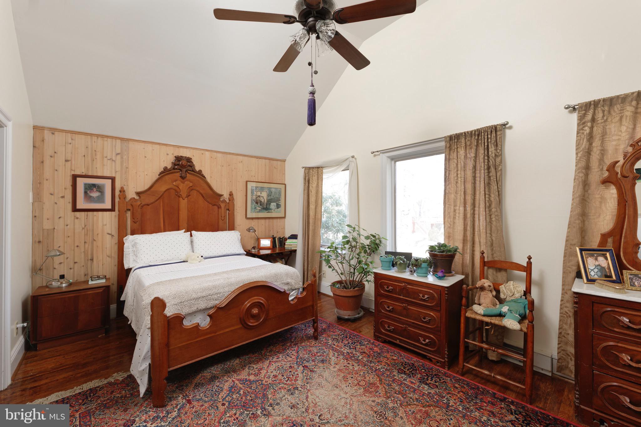 1608 Zulla Road Middleburg, VA 20117 - Photo 28 of 52 a bedroom with a bed and a dresser next to a window
