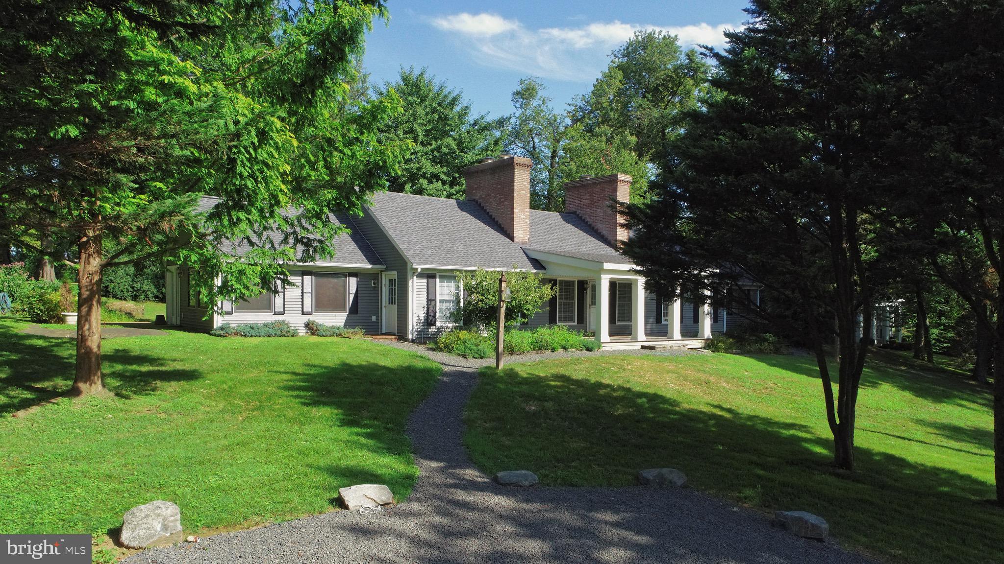 1608 Zulla Road Middleburg, VA 20117 - Photo 4 of 52 a view of a big yard with plants and large trees