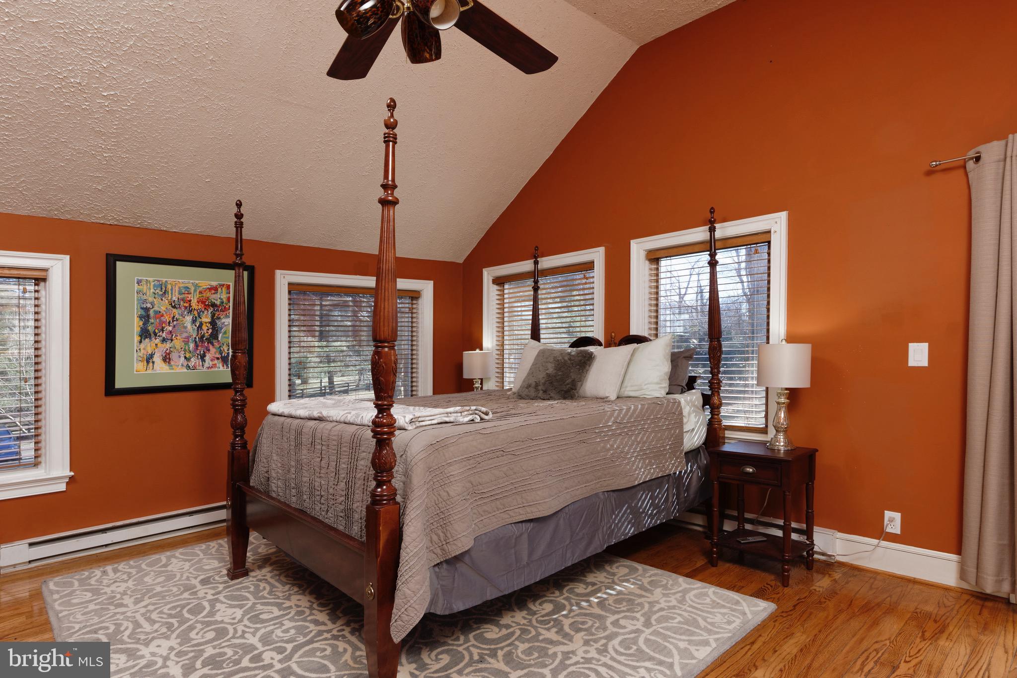 1608 Zulla Road Middleburg, VA 20117 - Photo 10 of 52 a bedroom with a bed and wooden floor