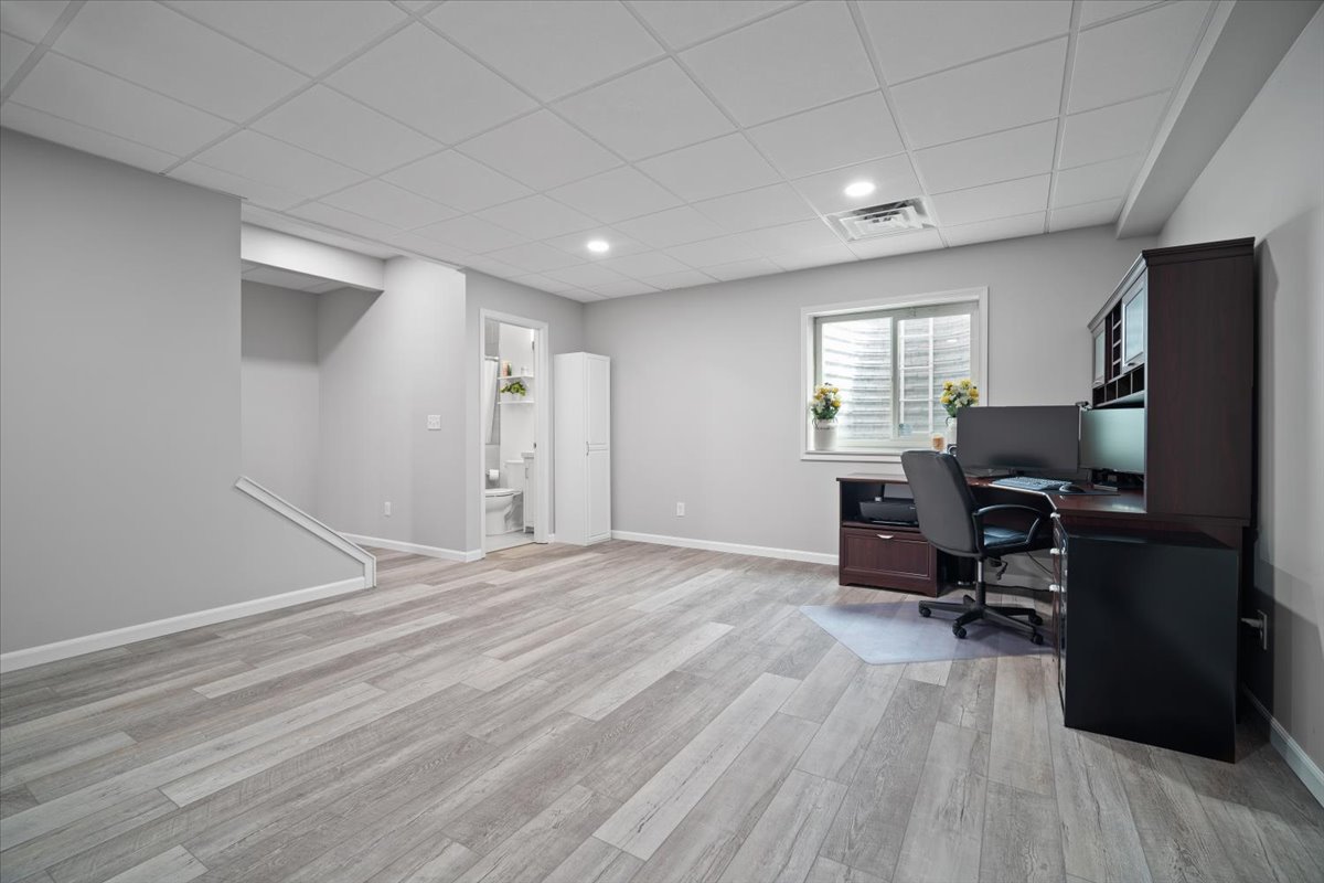 10901 Lake Road Dewitt, IL 61735 - Photo 23 of 30 a view of a workspace with furniture and a window
