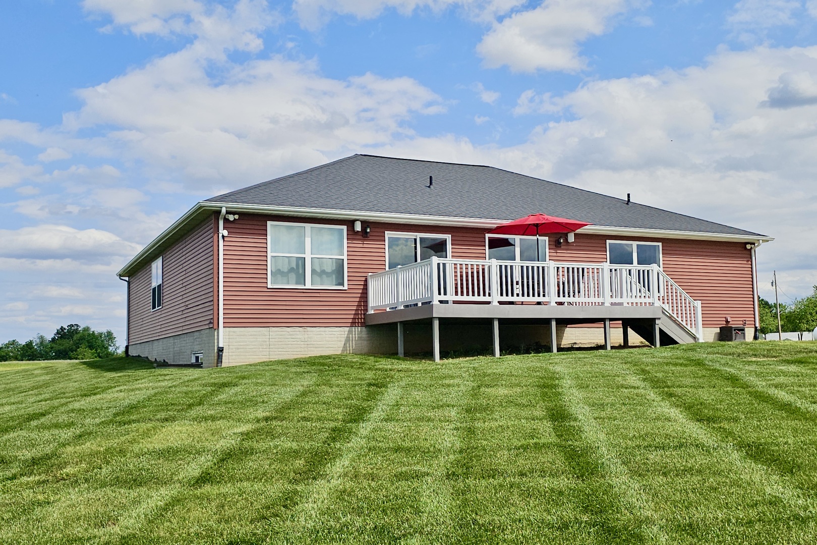 10901 Lake Road Dewitt, IL 61735 - Photo 3 of 30 a view of an house with backyard space and porch