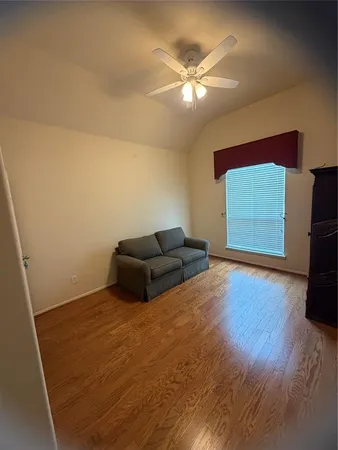 a house with trees in the background