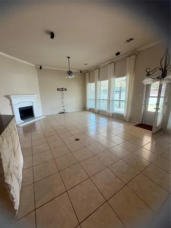 a view of a hallway with windows
