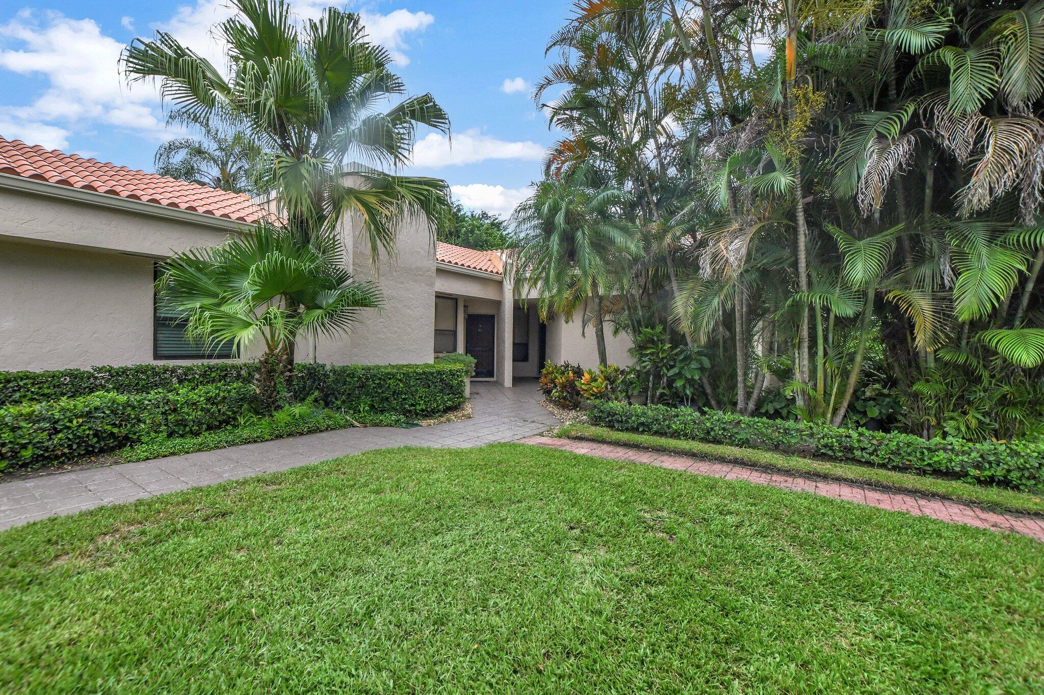 7495 La Paz Boulevard, Unit 102 Boca Raton, FL 33433 - Photo 1 of 36 Front