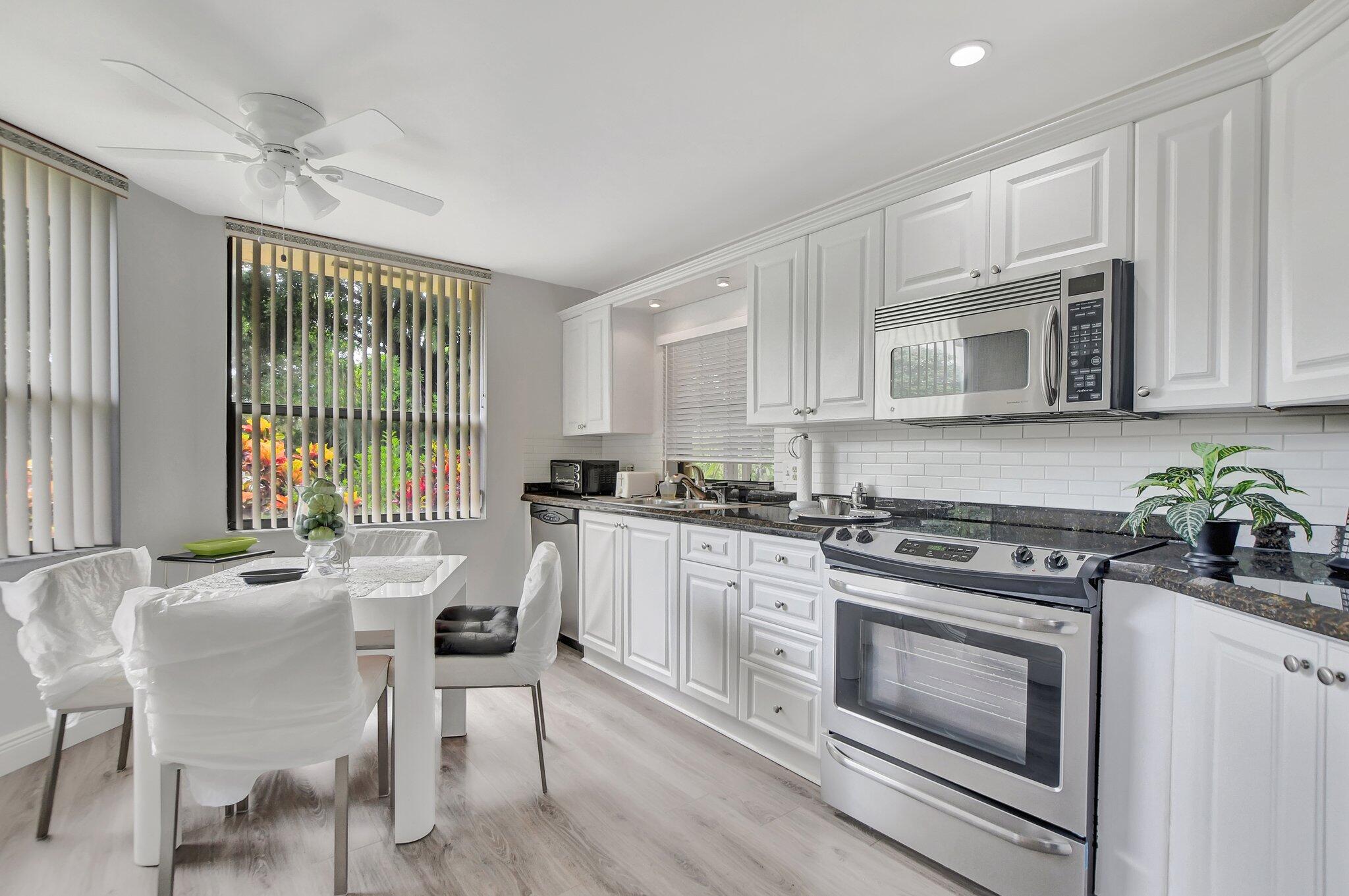 7495 La Paz Boulevard, Unit 102 Boca Raton, FL 33433 - Photo 12 of 36 Kitchen