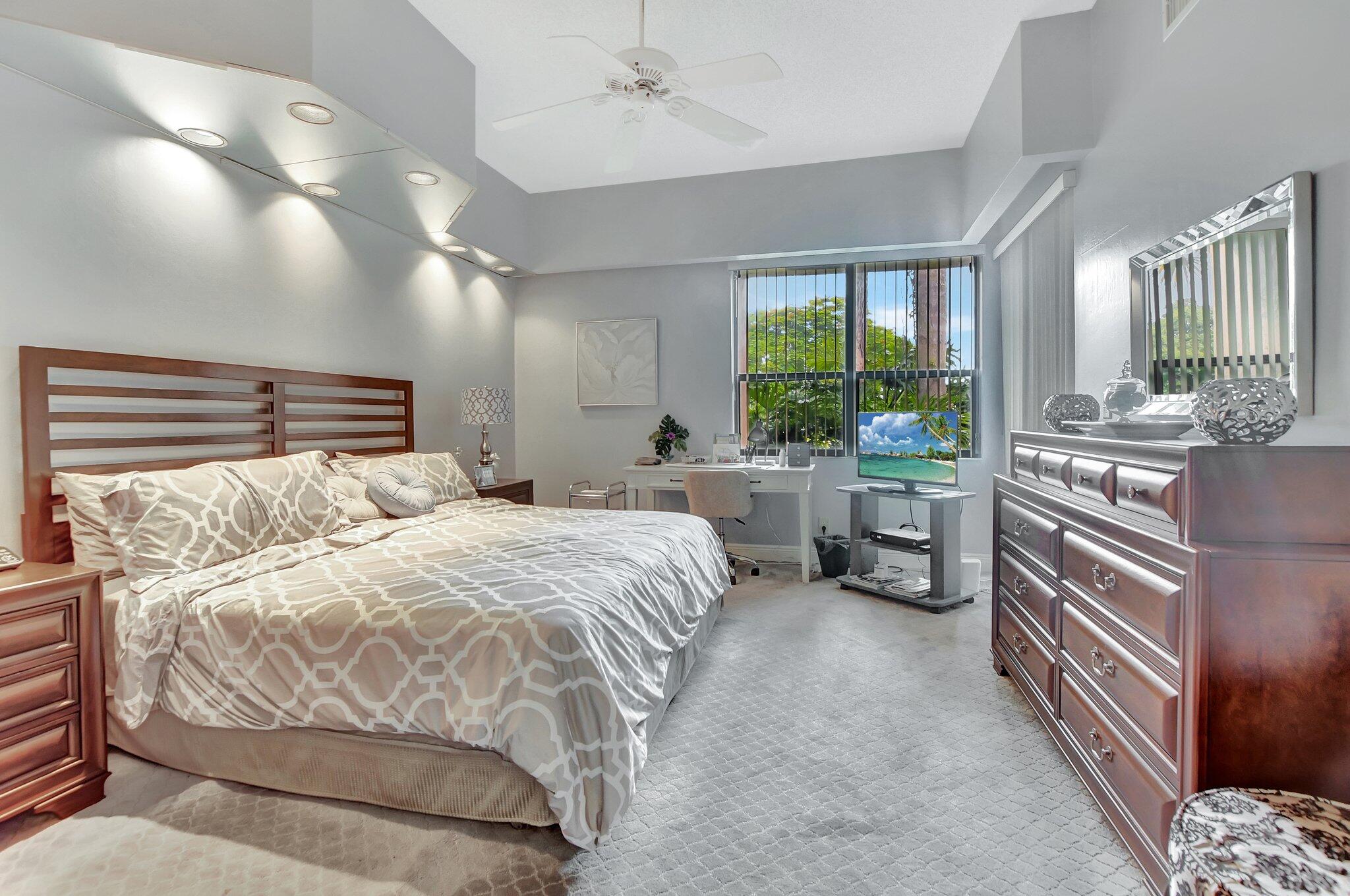 7495 La Paz Boulevard, Unit 102 Boca Raton, FL 33433 - Photo 16 of 36 master bedroom