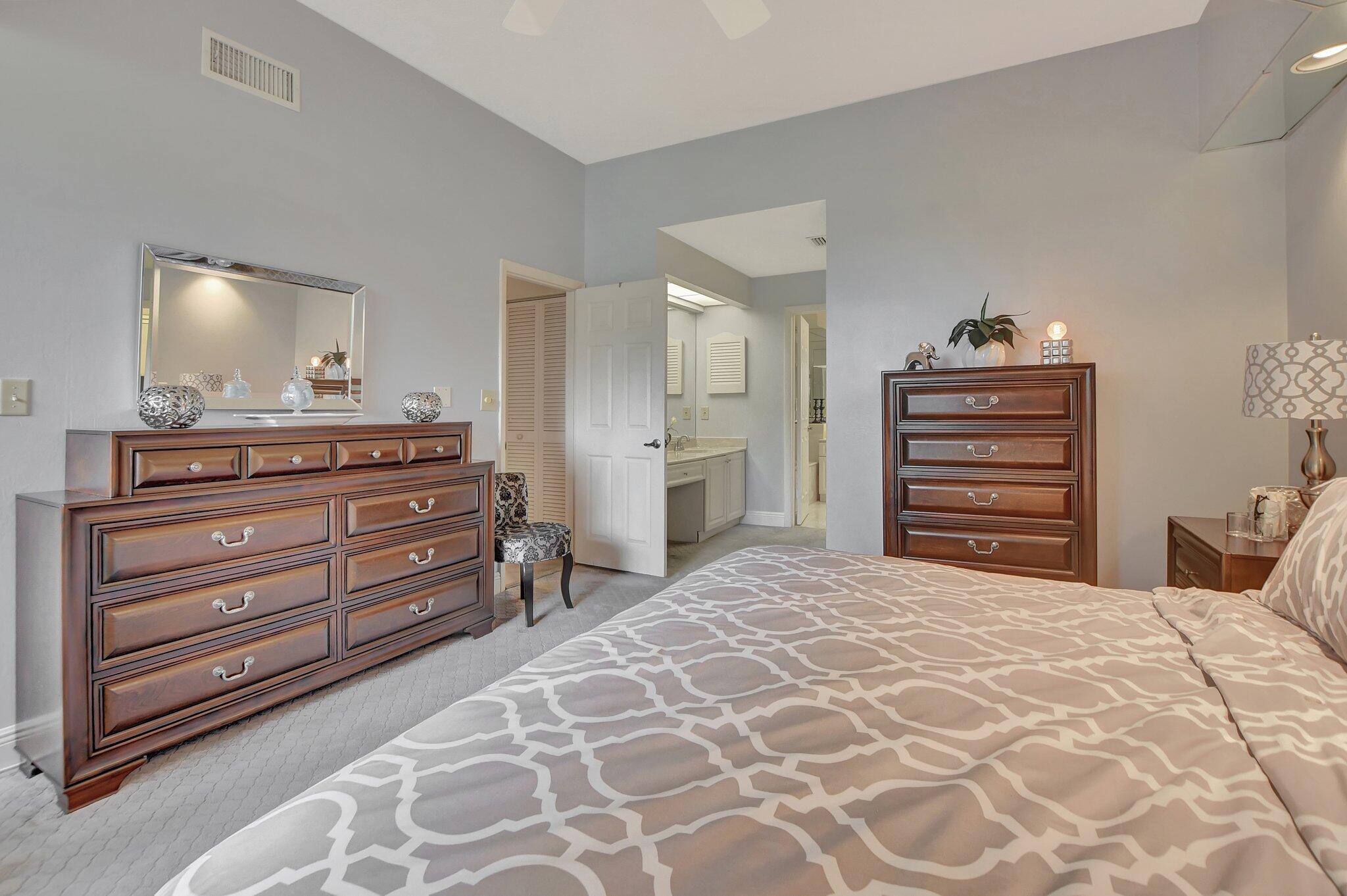 7495 La Paz Boulevard, Unit 102 Boca Raton, FL 33433 - Photo 17 of 36 Master bedroom