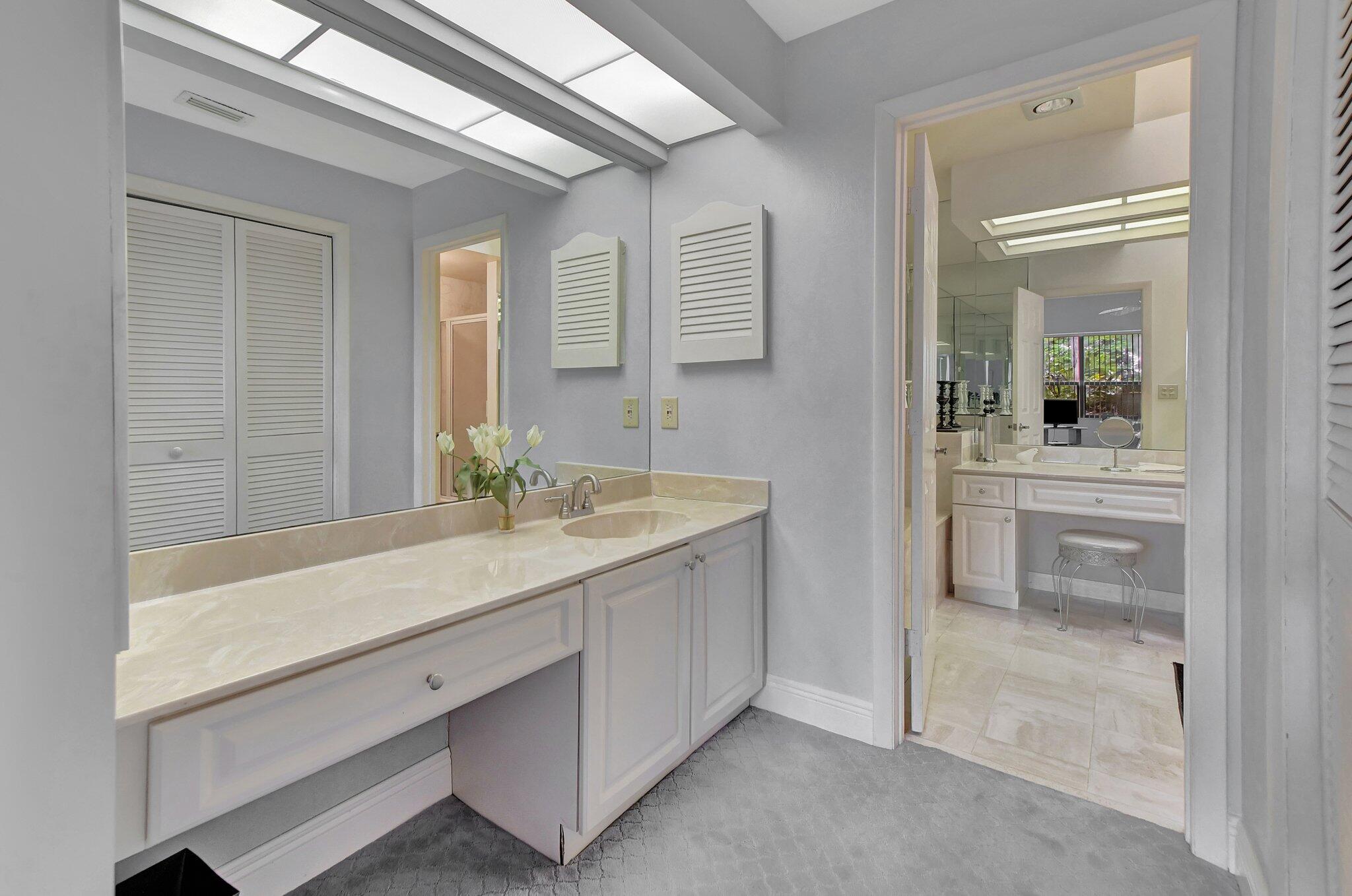 7495 La Paz Boulevard, Unit 102 Boca Raton, FL 33433 - Photo 19 of 36 Master bath