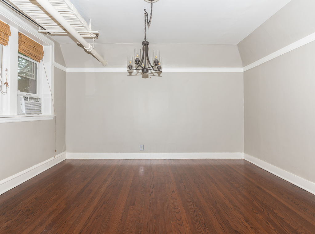 520 Sheridan Road, Unit G Evanston, IL 60202 - Photo 5 of 16 a view of a big room with wooden floor and windows