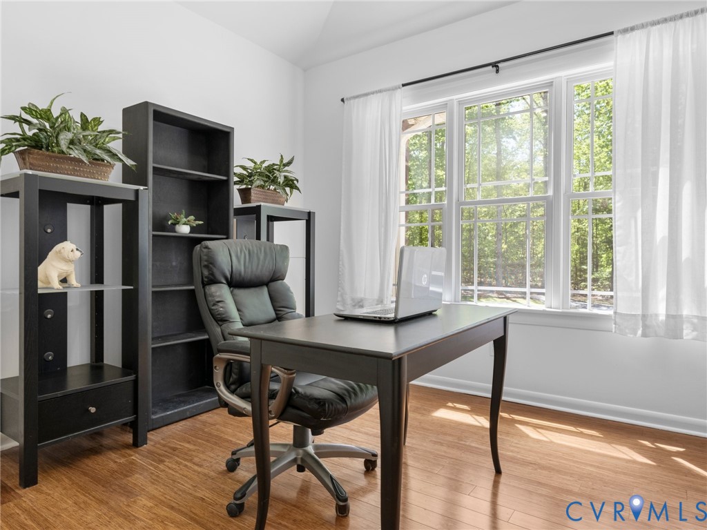 6126 Autumn Bluff Road Powhatan, VA 23139 - Photo 29 of 47 a view of a workspace with furniture and a window