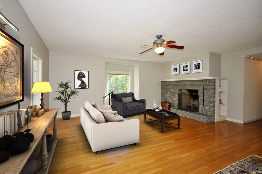 5 Partridge Pond Road Acton, MA 01720 - Photo 3 of 26 a living room with furniture and a fireplace