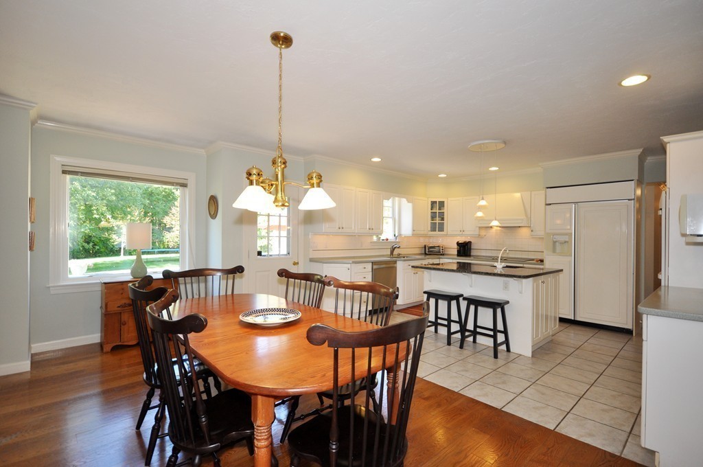 5 Partridge Pond Road Acton, MA 01720 - Photo 5 of 26 a view of a dining room with furniture window and wooden floor