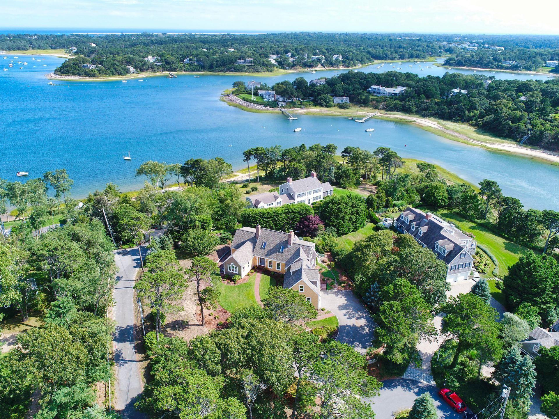830 Fox Hill Road Chatham, MA 02633 - Photo 49 of 52 an aerial view of ocean and residential houses with outdoor space