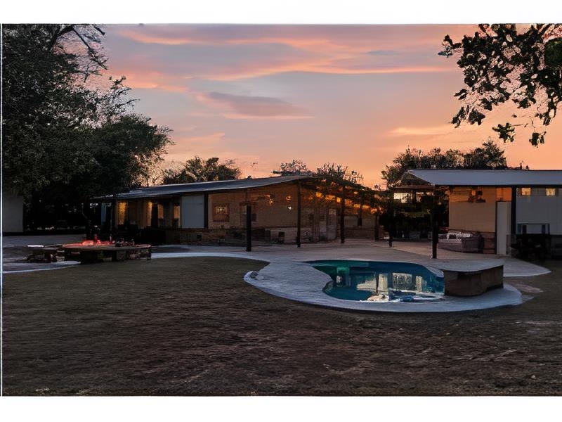 310 Thomas Ridge Road Burnet, TX 78611 - Photo 1 of 1 a view of house with outdoor space and sitting area