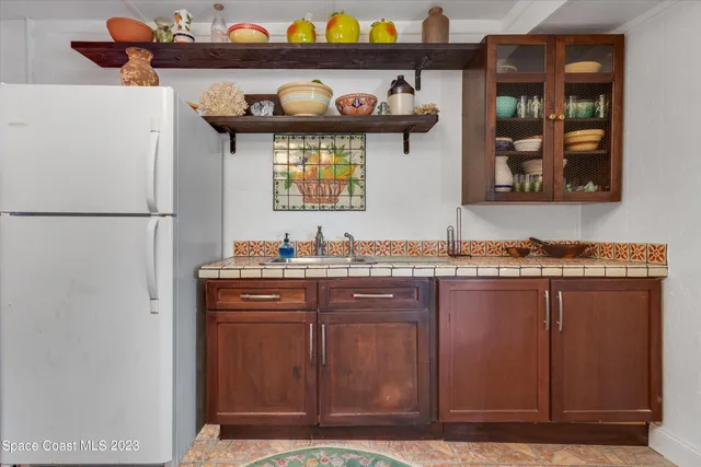 a front view of a house with swimming pool
