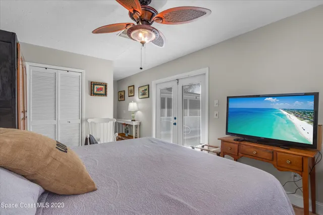 a view of a patio with table and chairs and garden
