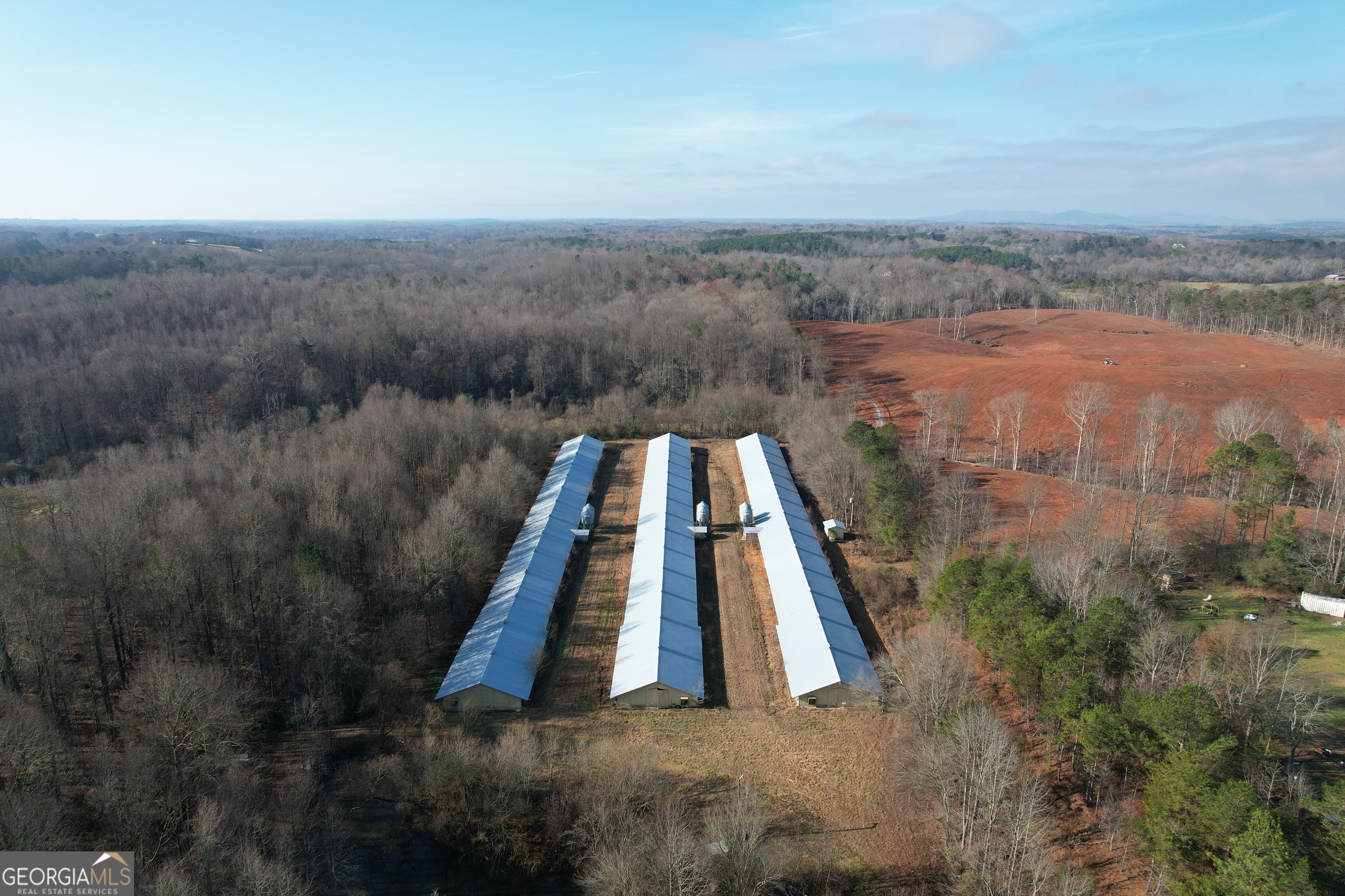 0 J J Warren Road Cornelia, GA 30531 - Photo 1 of 20 a view of a yard with a wooden bridge