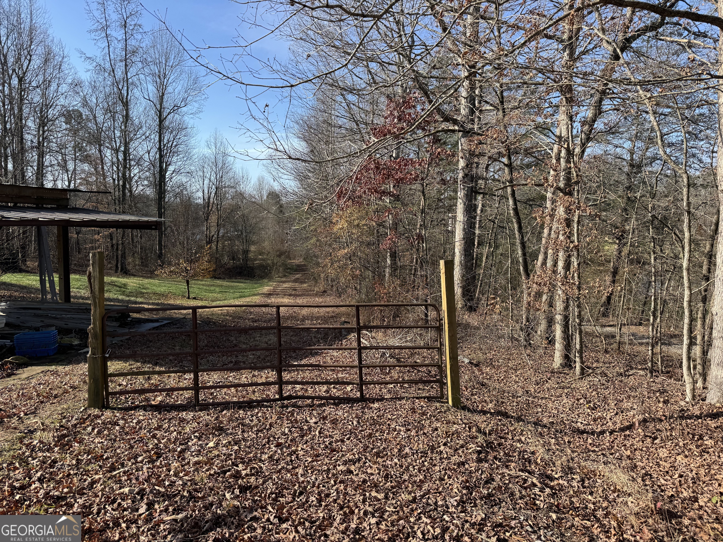 0 J J Warren Road Cornelia, GA 30531 - Photo 3 of 20 a view of a bench in backyard