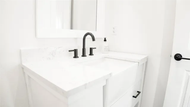 a bathroom with a sink and a bathtub