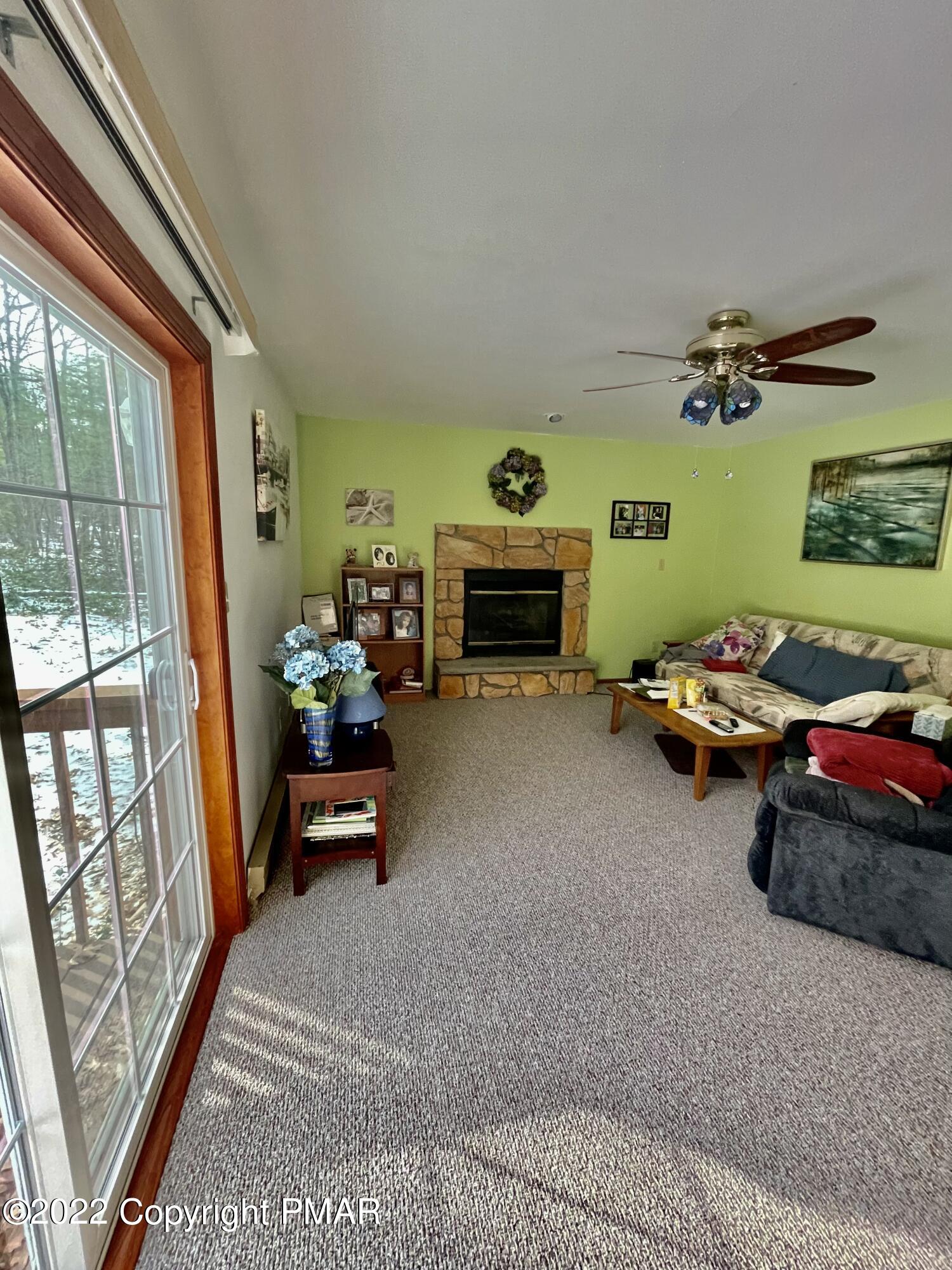 165 Comanche Pines Road Effort, PA 18330 - Photo 7 of 20 a bedroom with furniture and a window