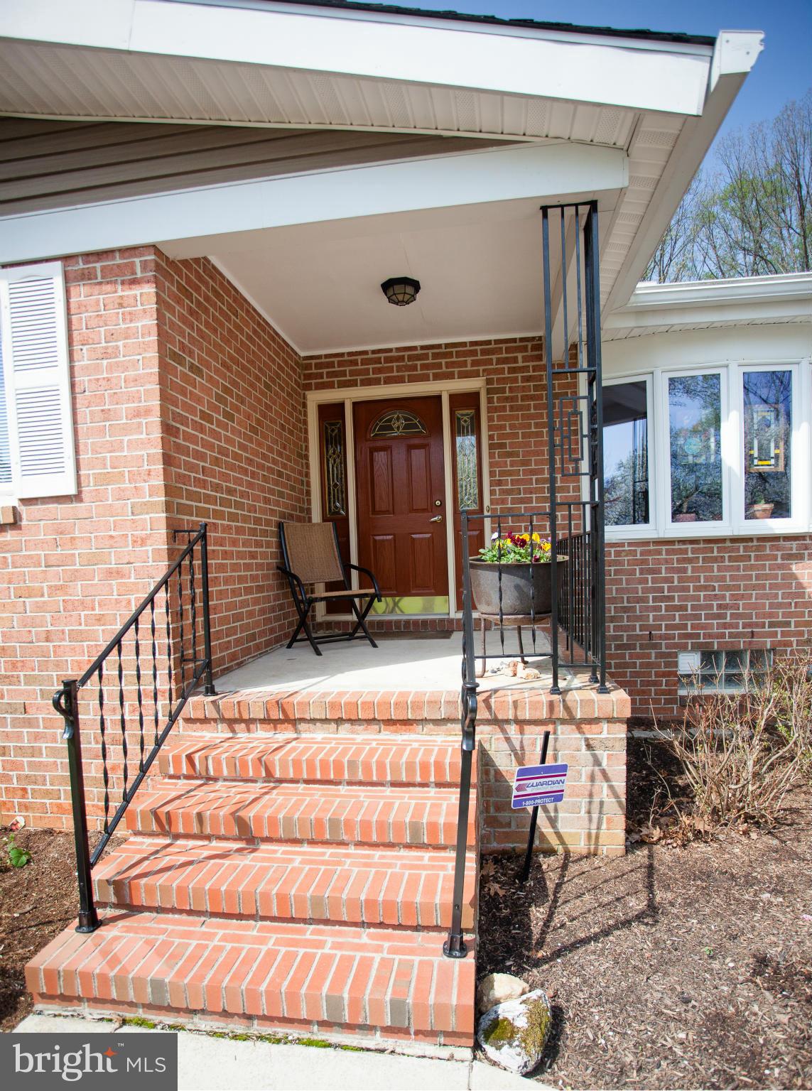 9407 Jodale Road Randallstown, MD 21133 - Photo 2 of 26 a view of a chairs and table in the back yard of the house