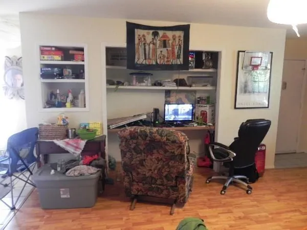 a living room with furniture and a window