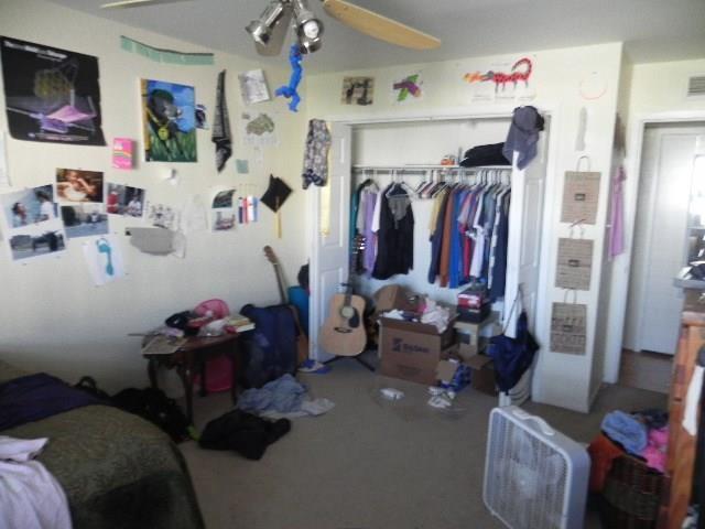 910 Duncan Lane, Unit 49 Austin, TX 78705 - Photo 20 of 27 a view of walk in closet with clothes and shoes