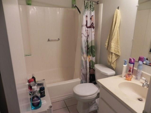 910 Duncan Lane, Unit 49 Austin, TX 78705 - Photo 22 of 27 a bathroom with a sink toilet and shower