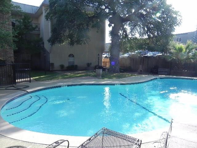 910 Duncan Lane, Unit 49 Austin, TX 78705 - Photo 4 of 27 a view of a backyard