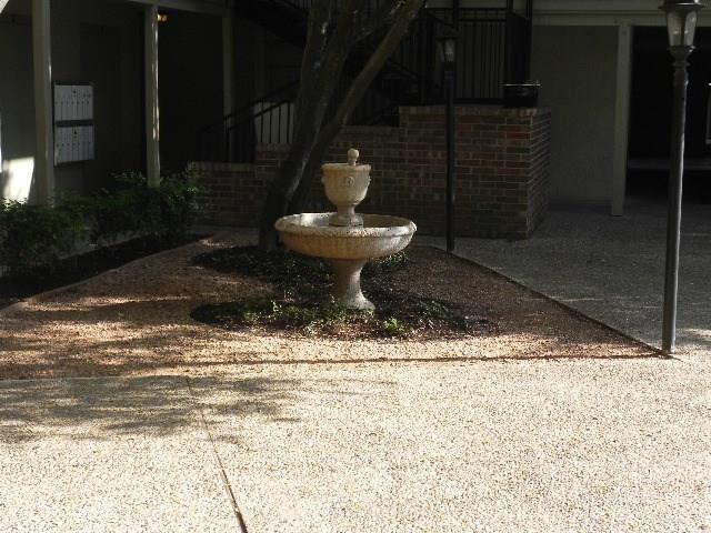 910 Duncan Lane, Unit 49 Austin, TX 78705 - Photo 7 of 27 a view of a backyard of the house