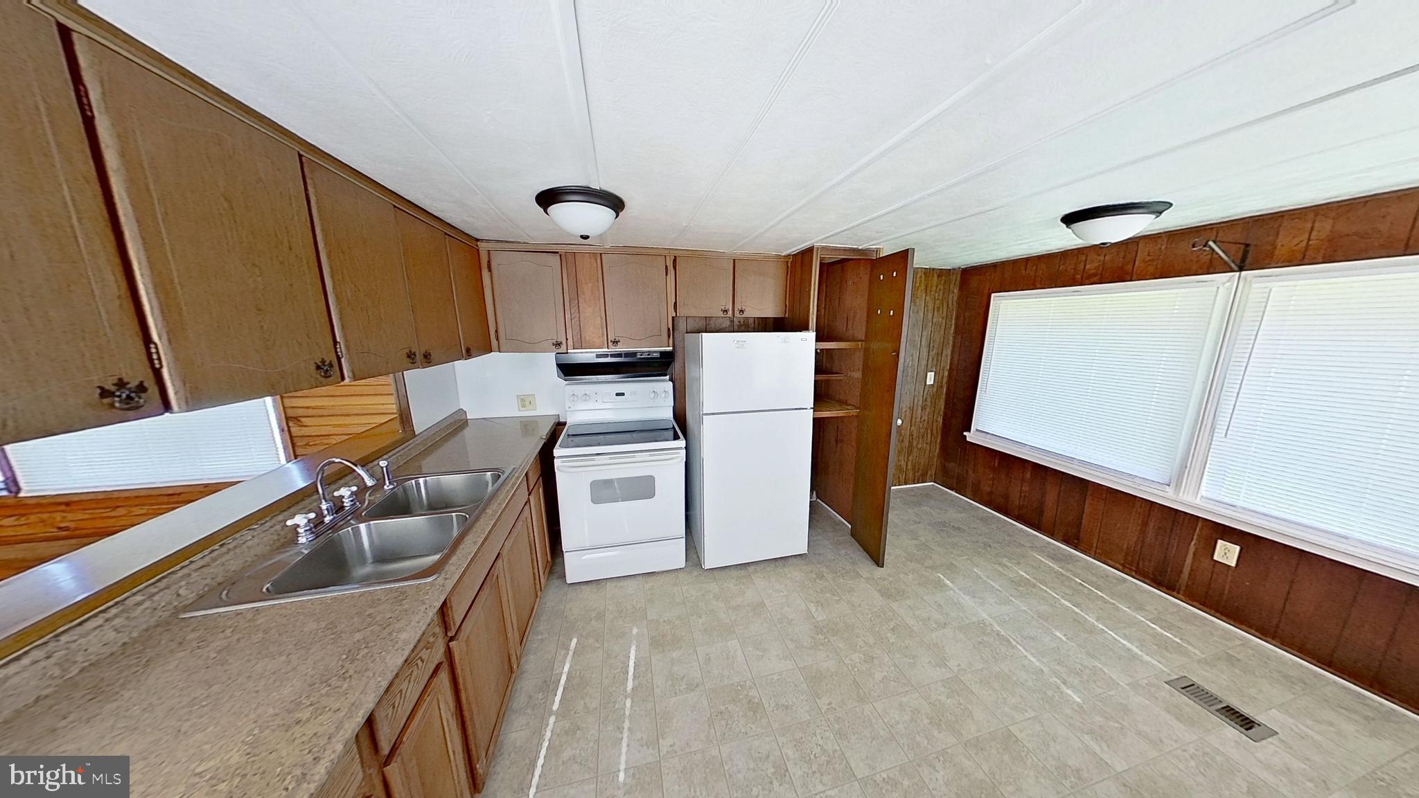 1163 Tower Road Hellam, PA 17406 - Photo 11 of 11 a work place with table chairs and refrigerator