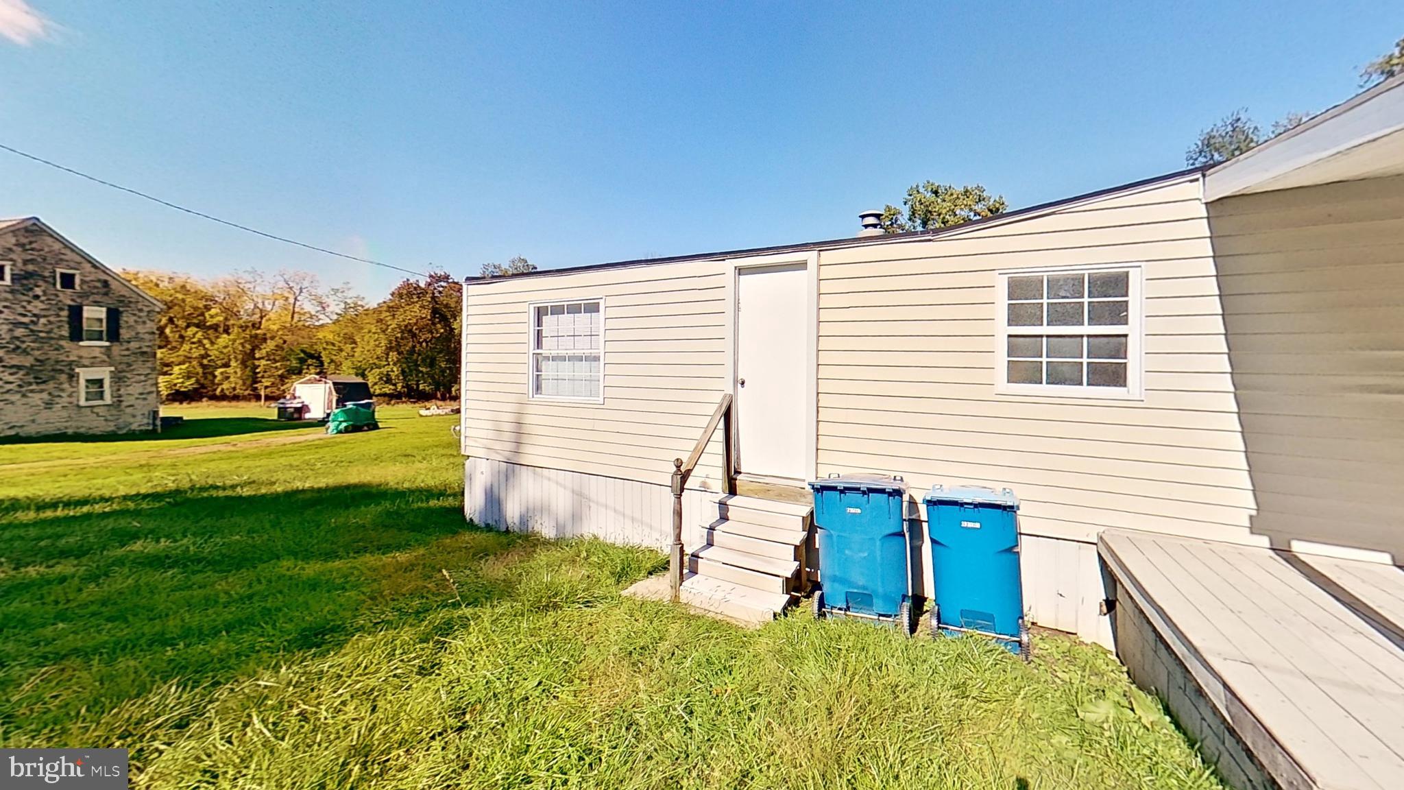 1163 Tower Road Hellam, PA 17406 - Photo 2 of 11 a view of a house with backyard and a tree
